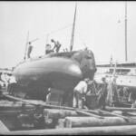 The USS Holland, the Navy's first submarine, in 1900. Holland