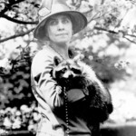 First Lady Grace Coolidge holding Rebecca the Raccoon. The raccoon barely ranks in the top ten for strangest presidential pets.