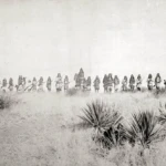 Apache warriors line up in the Sierra Madre mountains, ready to face off against the U.S. Army.