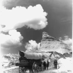 Wagon trains crossed mountain ranges, risking everything for the chance at a better life.