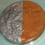 Olympic athletes often become close friends. The friendship medal
physically combined silver and bronze to demonstrate that
commitment. Wikimedia Commons